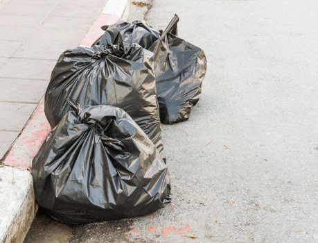 Trucks transporting builders waste for clearance in Richmond